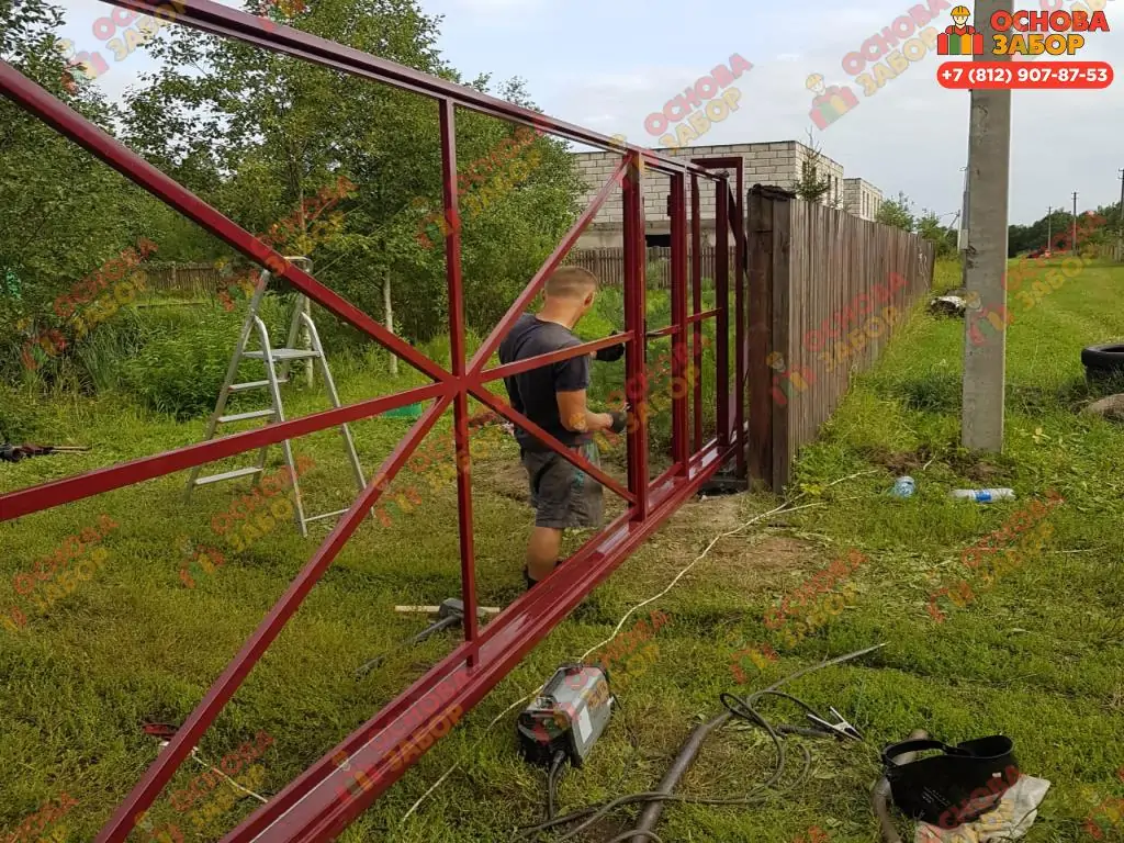 Откатные ворота со встроенной калиткой из штакетника в Санкт Петербурге 2025 OsnovaZaborru Откатные ворота со встроенной калиткой из штакетника в Санкт Петербурге фото OsnovaZaborru